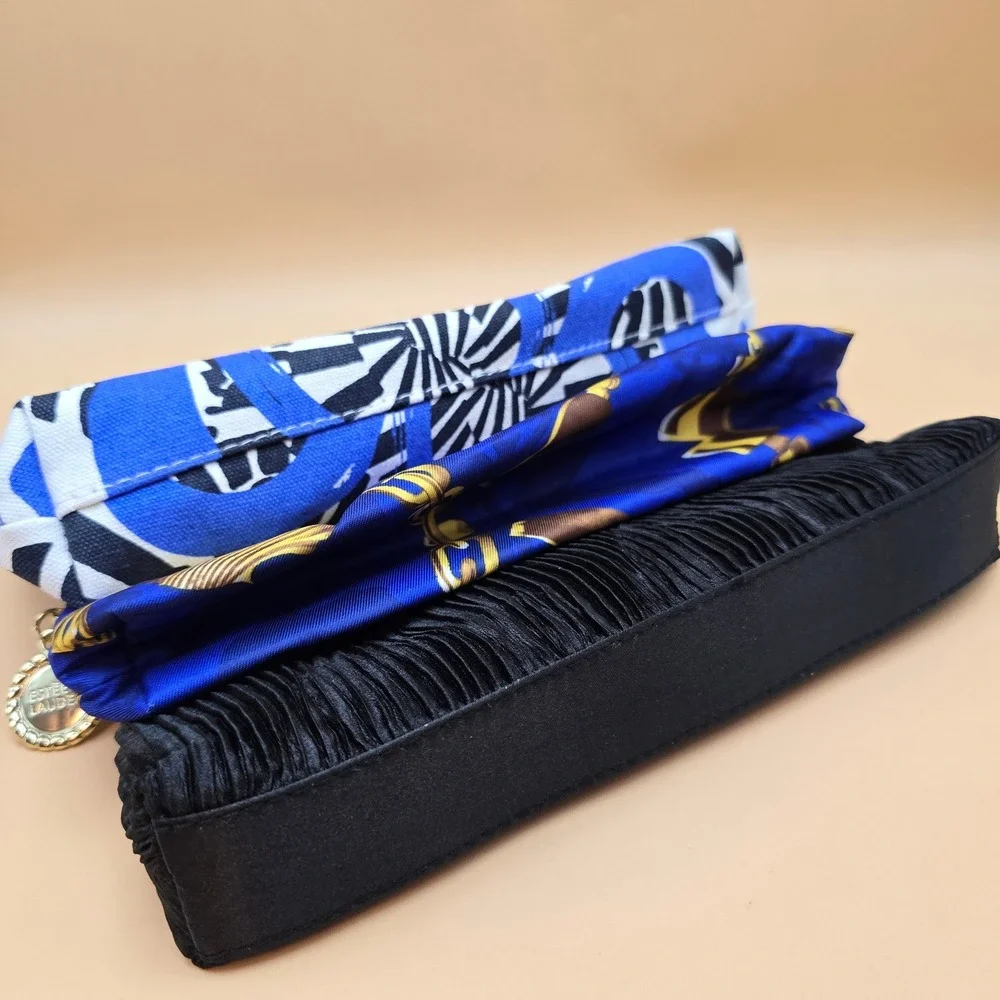 Estee Lauder or clutch